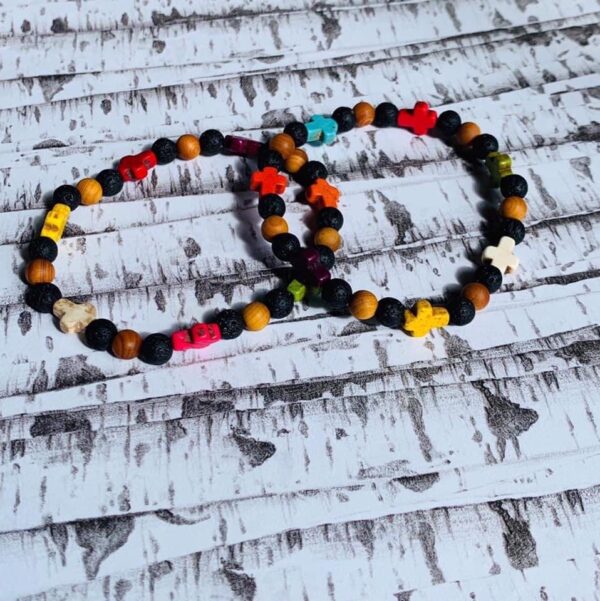 Cross and lava bracelet